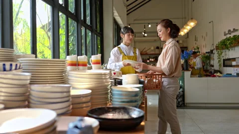 Close-up view of a customer reaching to pick a product Video stock 339640779
