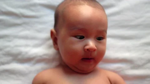 Close-up view of cute asian baby's face Stock Footage 201311613