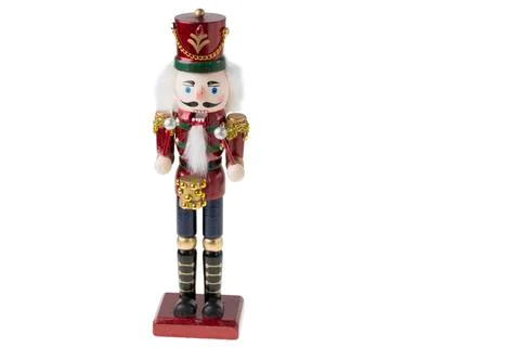 Close up view of cute Nutcracker figure on white background. Stock Photos
