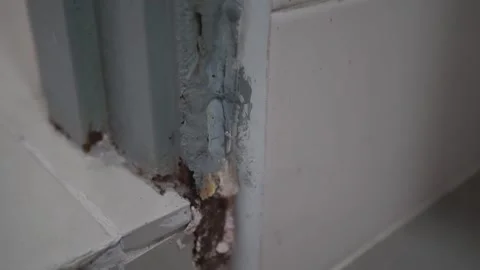Close-up view of the damaged door frame. 動画素材 263037938