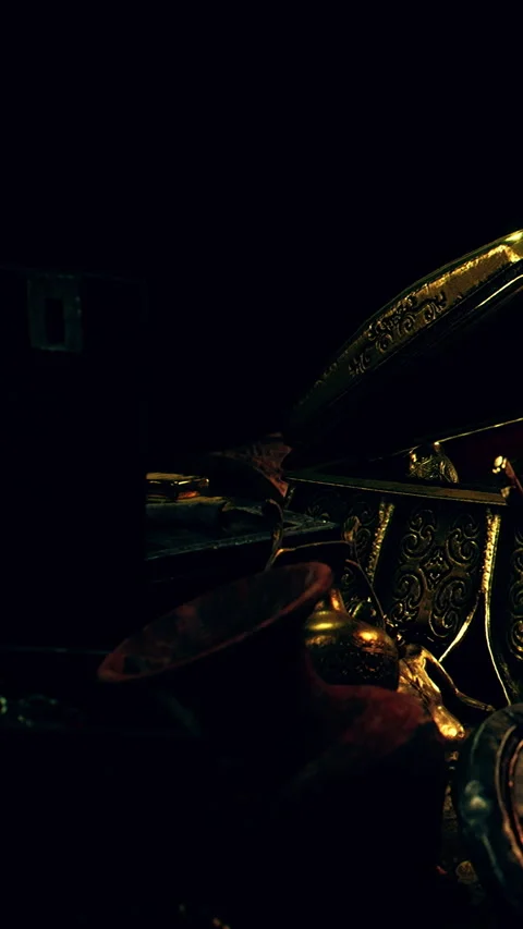 Close view of decorative artifacts and objects on dark background Stock Footage 347166185