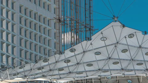 Close up view of Defence business district in Paris timelapse. People sitting on Stock Footage 236587765