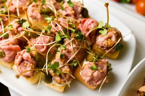 Close-up view of delicious appetizer with bread and pate decorated with 스톡 사진