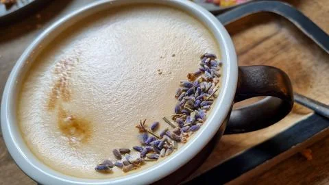 Close-up view of delicious aromatic cup of coffee. Latte, cappuccino art Stock Photos