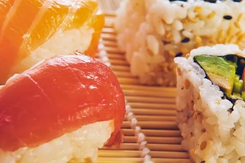 Close up view of delicious assorted sushi and rolls Stock Photos