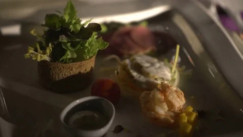 The close-up view of the delicious dish consisting of meat, salad, fish, shrimps Stock Footage 82638979
