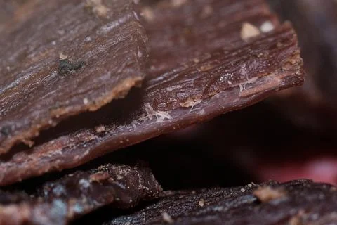 Close-up view of delicious dried beef jerky slices showing rich texture and.. Stock Photos