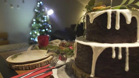 Close up view on delicious gingerbread cake on decorated Christmas dinner table  Stock Footage 132676694