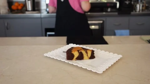 Close up view of a delicious marble cake slice with rich chocolate and creamy Stock Footage 315483899