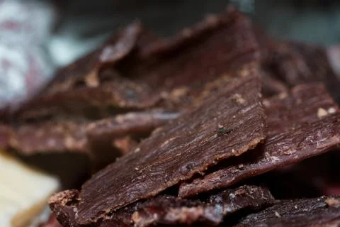Close-up view of delicious savory beef jerky pieces piled together for a snac Stock Photos
