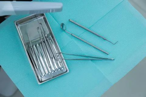 A Close-Up View of Dental Instruments on a Sterilized Tray, Ready for Use in a Stock Photos