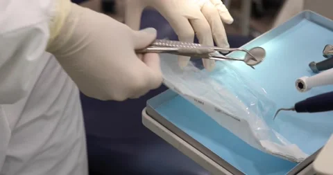 Close Up View Of Dentist Opening Bag With Tools Stock Footage 148088750