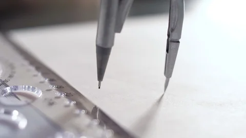 Close view designer draws circle with compass on sketch Stock Footage 102306358