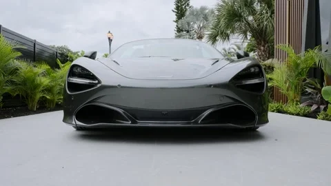 Close up view of detailed front bumper of expensive modern sport car with Stock Footage 259715142