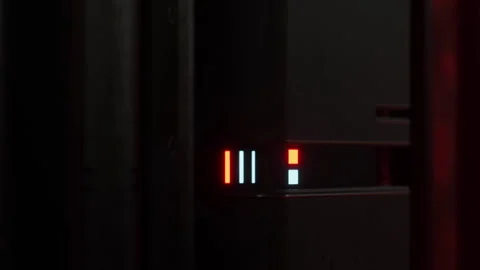Close view of a device with lights in a dark environment during a tech event Stock Footage 344984628