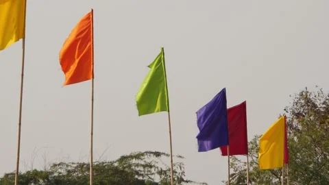 Close-up view of different color flags waving, Different color flags footage Video stock 151937303