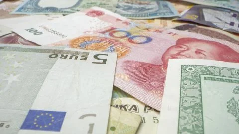 Close up view of different currency of the world Stock Photos