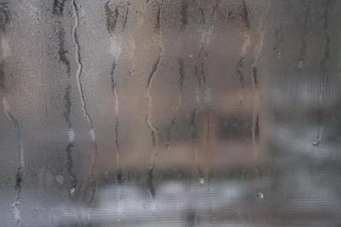 Close view of a distinctly dirty window showing grit, grime, streaks and opac Stock Photos