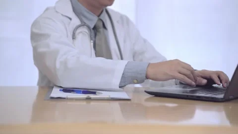 Close up view of doctor working using laptop. Stock Footage 144650932