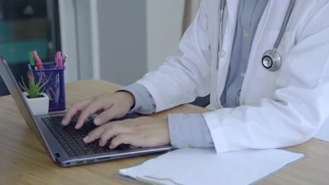 Close up view of doctor working using laptop. Stock Footage 145532281