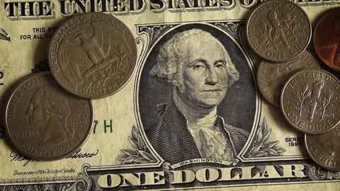 Close-up View Of A Dollar And Coins 스톡 동영상 101853955