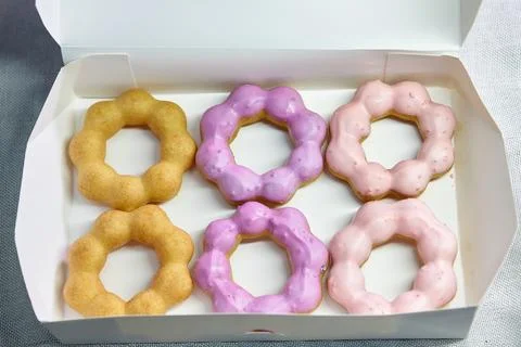 Close-up view of Donuts in paper box Stock Photos