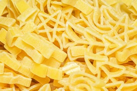Close-up view of dried star-shaped pasta, a fun and versatile ingredient fo.. 스톡 사진