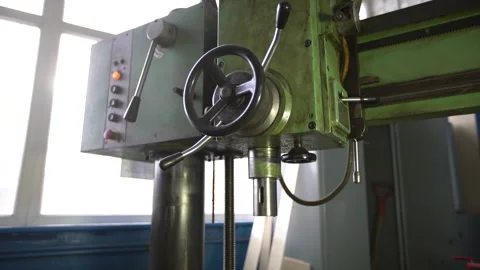 Close view of drilling milling machine with control knobs in workshop Stock Footage 330638262