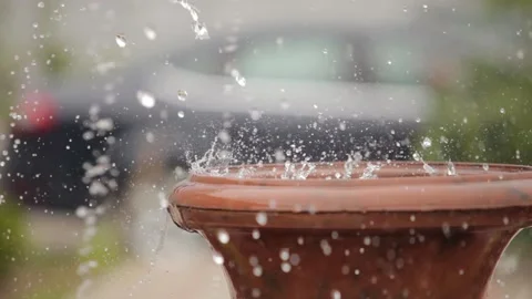 Close-up view of drops and splashes of water in a fountain. Water is pouring Video stock 145267108