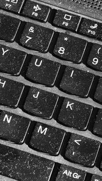 Close-up view of a dusty computer keyboard  Stock Photos