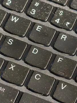 Close-up view of a dusty computer keyboard  Stock Photos