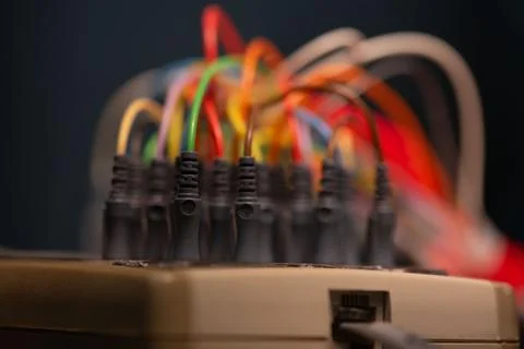 Close-up view of EEG cables plugged-in to the socket Stock Photos