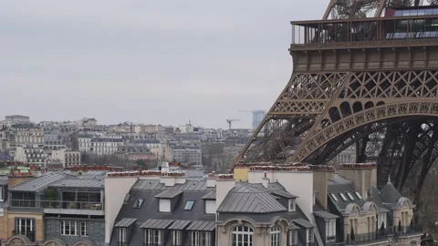 Close up view of the Eiffel Tower first floor in Paris, from a balcony. Slow Stock Footage 301855621