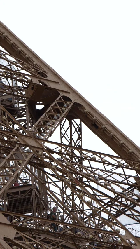 Close Up View of the Eiffel Tower Iron Structure in Paris Stock Footage 335194692