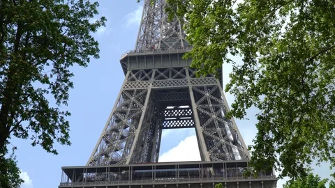 Close up view of the Eiffel Tower from the park Stock Footage 108125656