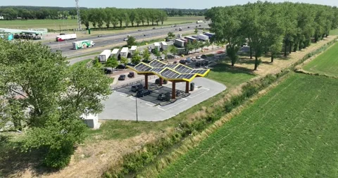 Close up view of an electric charging station along a highway for electric Stock Footage 254193967