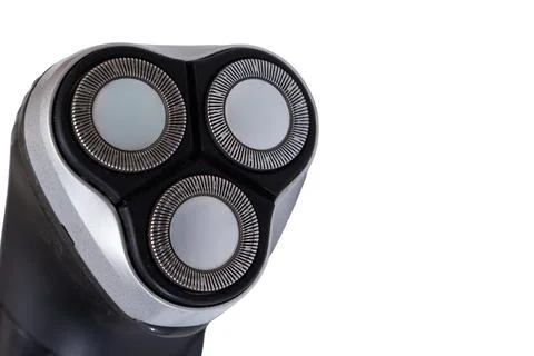 Close-up view of an electric razor head featuring three circular shaving 写真素材