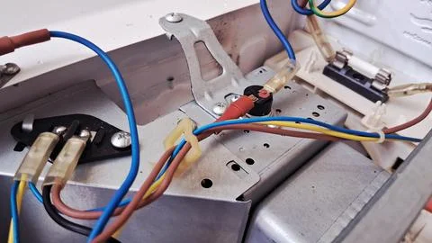 Close up view of electrical wires inside a microwave oven unit Stock Photos