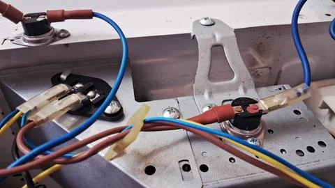 Close up view of electrical wires inside a household appliance Stock Photos