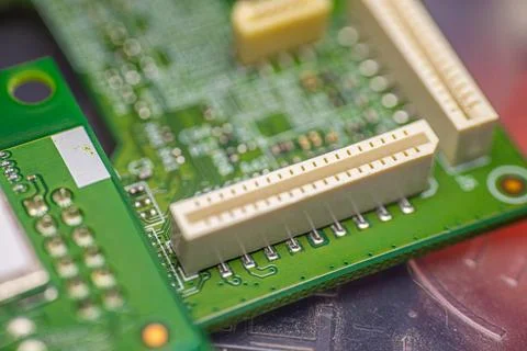 Close-up view of electronic circuit board with multiple connectors and intr.. Stock Photos