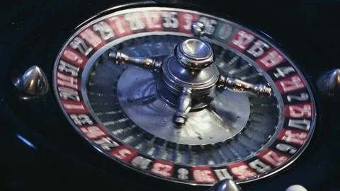 Close up View of an Elegant Casino Roulette Wheel Spinning with Ball Video stock 343431794