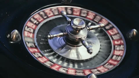 Close up View of an Elegant Casino Roulette Wheel Spinning with Ball 库存影片 344680738