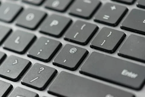 Close up view of email icon on a computer keyboard keys Stock Photos