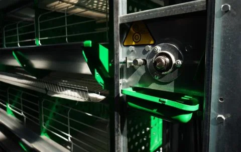Close-up view  of empty caged rearing equipment in Chicken Farm. Stockfoto's