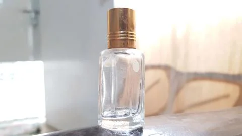 Close up view of an empty oud attar oil glass bottle Stock Photos