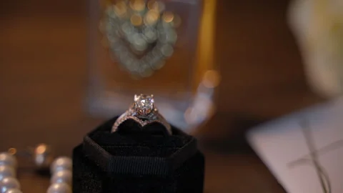 Close up view of the engagement ring in the dark velvet ring box. Wedding Stock Footage 304442333