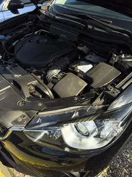 Close-up view of the engine compartment illustrates the complex parts and mac Stock-Fotos