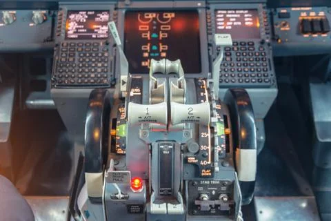 Close up view on engine power control and other aircraft control unit in the  Stock Photos