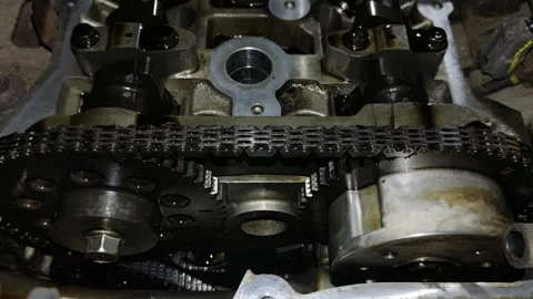 Close-up view of engine timing chain and camshaft assembly Stock Footage 347085734