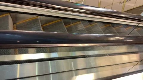 Close-up View of Escalator Step Mechanism in Motion That Showcases Its Stock Footage 316428307